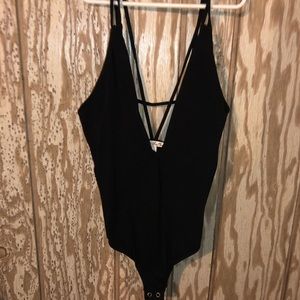 Super cute plunge tank body suit